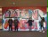 Die Schüler der Klasse 7b stehen vor dem fertigen Graffiti. Der Schriftzug lautet „Nation Mensch“.